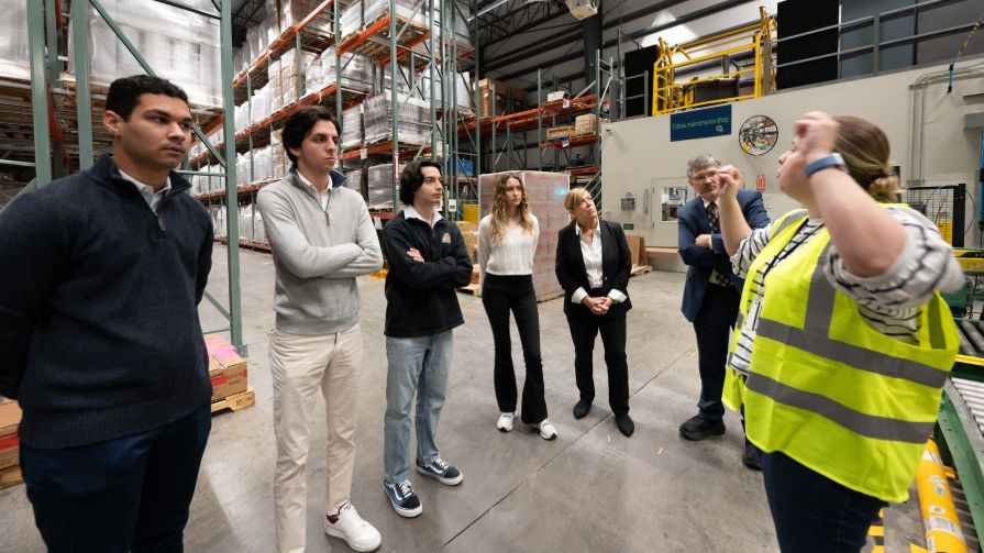 BryantGlobal Supply Chain Management students tour Edesia nutrition